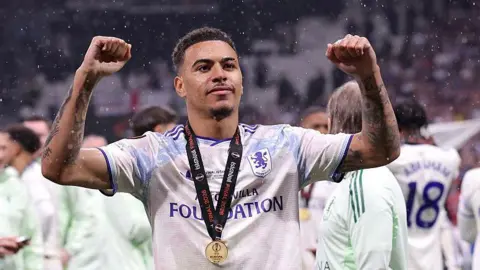 Morgan Rogers celebrates winning the Europa League with Aston Villa