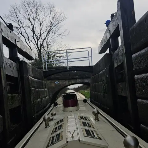 Jessica Loach The narrowboat inside a lock