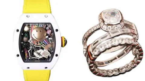 A Richard Mille watch and a stack of diamond rings 