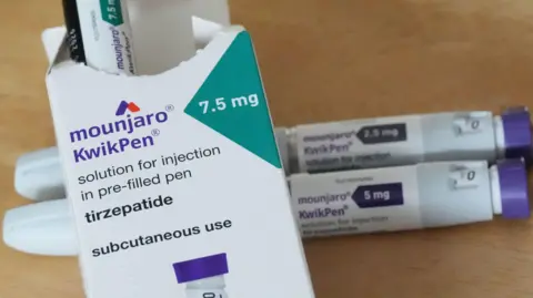 Stock image of Mounjaro boxes and jabs.