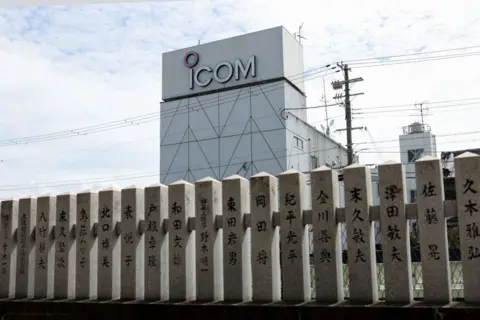 Getty Images The gray office building of Japanese walkie-talkie maker Icom