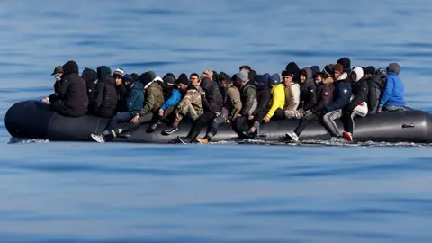 EPA About 60 migrants cross the English Channel on a small boat, on 06 March 2024. 