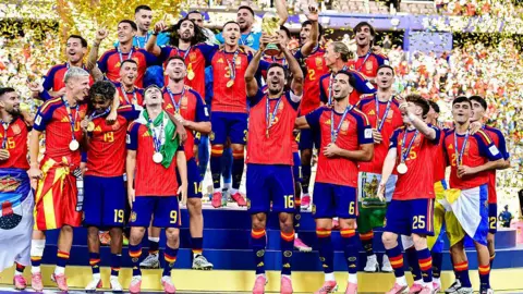 Spain lift the World Cup trophy