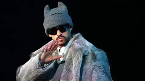 Bad Bunny greets fans and the media at a press conference for the 2026 Super Bowl Half Time Show