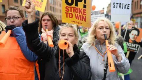 A group of women at a protest 