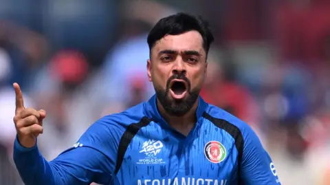 Afghanistan leg-spinner Rashid Khan celebrates taking a wicket