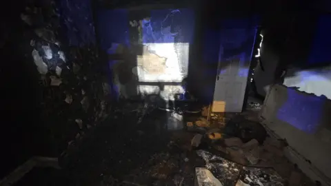 A badly burned room inside the property where the fire took hold