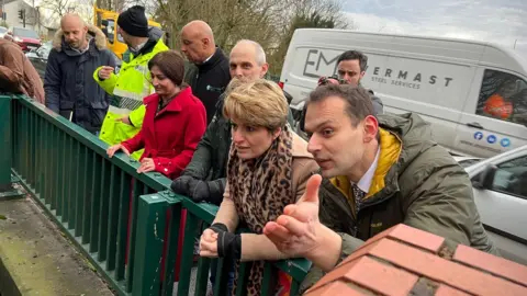 Water and Flood Minister Emma Hardy and Makerfield MP Josh Simons inspect nearby Heyes Brook in Platt Bridge following the New Year's Day floods
