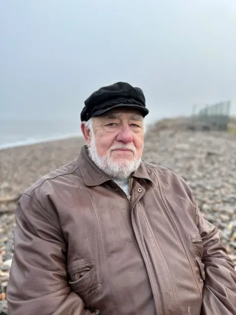 Jim Mackie at the beach in Kingston