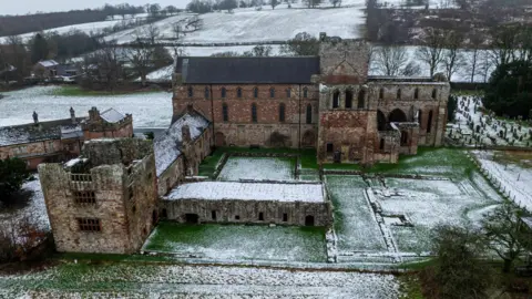 Overhead shot of church in the snow