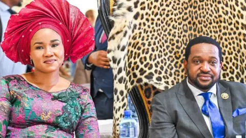 KwaZulu-Natal government/Facebook Nomzamo Myeni in a red fan headdress and embroidered dress and King Misuzulu KaZwelithini in a suit and blue tie.