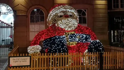 BBC The UK's largest light up santa in the dark