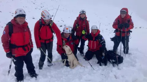 Wasdale MRT Rescuers with one of the dogs