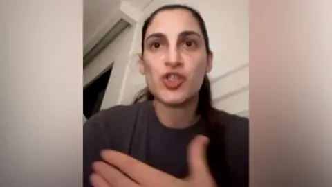 Zeynab Javadli speaking on a video call.