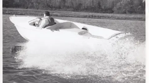 Alfred E Roberts A black and white photographer of a speedboat being driven on a lake by Donald Campbell. 