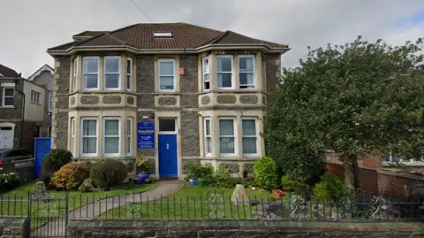 Google Maps Entrance to school with plants outside