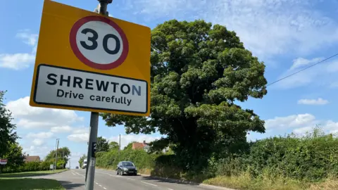 A sign for Shrewton village