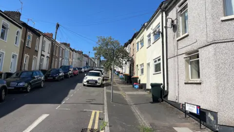 St Edwards Street in Newport with cars parked either side of the road.