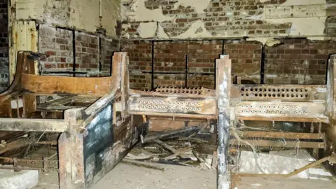 Sam Dawson The decaying remains of a wartime switchboard in the Deepdene Hotel.