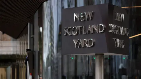 The sign of Scotland Yard in Westminster in London, 
