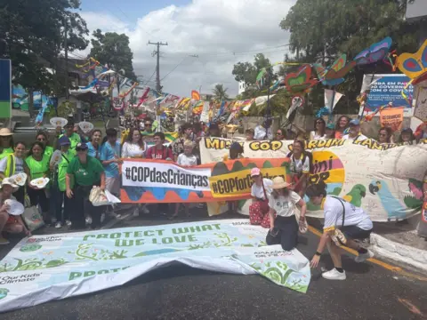 BBC A group of protesters in Brazil