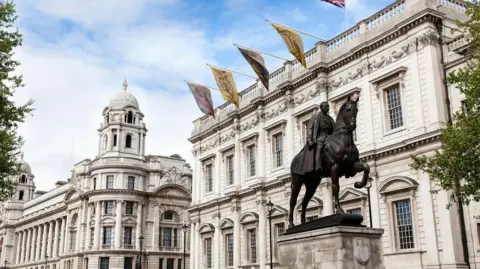 Getty Images Whitehall street in London a cloudy day with cenotaph war memorial and Foreign and Commonwealth Office