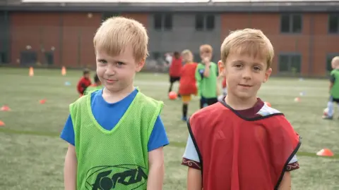 Two young boys who play at Halas Hawks Junior Football Club in Halesowen.