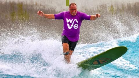 Julian Roe surfing