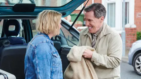 BBC/Toffee International Ltd/Tom Jackson Joanna Page and Rob Brydon pictured on set at Trinity Street in Barry.