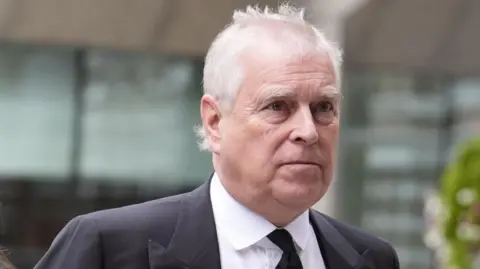 A close-up of Andrew Mountbatten-Windsor in a suit.