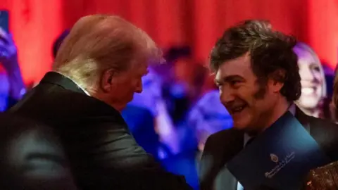 Reuters US President-elect Donald Trump shakes hands with Argentine President Javier Milei at the America First Policy Institute (AFPI) gala at Mar-A-Lago in Palm Beach, Florida, on November 14, 2024