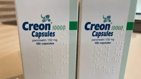 Two boxes that say Creon Capsules on them.