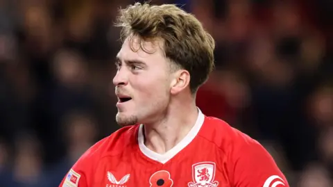 Aidan Morris letting out a big roar in the direction of Middlesbrough supporters