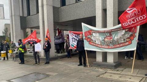 Protests outside Aberdeen City Council's annual budget meeting