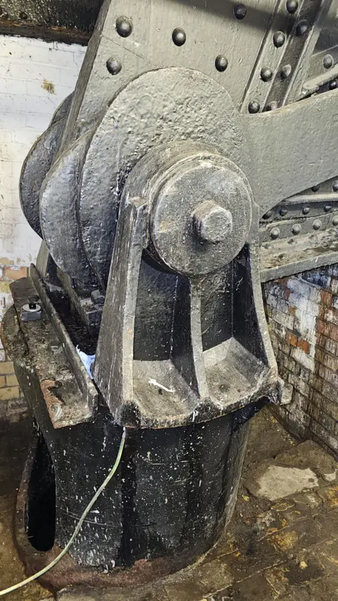 Royal Borough of Kensington and Chelsea A huge bolt structure rests on a black piece of metal