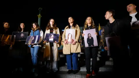 SERGEY DOLZHENKO / EPA Former colleagues held a vigil in Kyiv in memory of Viktoriia Roshchyna