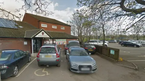 The building and car park of Nottingham Moderns Rugby FC, in Main Road, Wilford, Nottingham.
