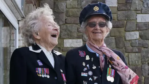 GARETH FULLER/PA WIRE Ms Barron and Ms Hall in military dress