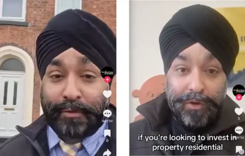 The photo shows Tony Singh looking at the camera as part of a promo video. He's an asian man wearing a Turban. He is dressed in a blue shirt, navy waistcoat and maroon tie. 