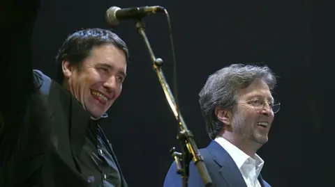 Getty Images Eric Clapton and Jools Holland at Tsunami Relief Cardiff in 2005