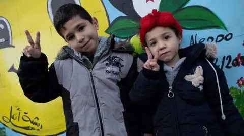 BBC Two young children in Aleppo.