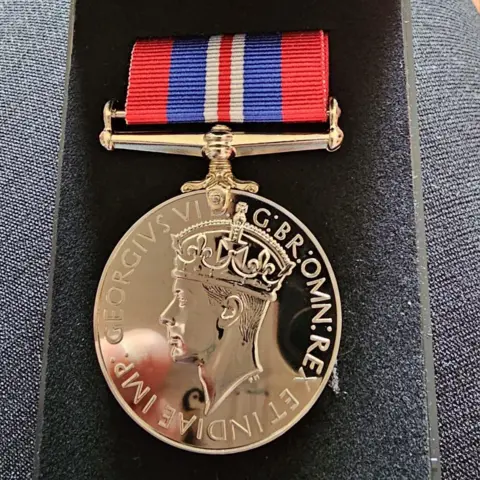 Elgar Care Mr Filby's medal