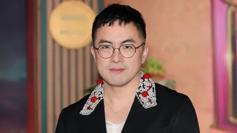 Getty Images Bowen Yang seen at a Wicked premiere