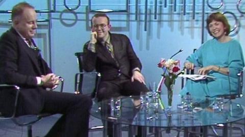 Ned Sherrin and Ian Hislop sit in a studio with Joan Bakewell.