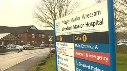 The Wrexham Maelor Hospital sign outside the building.