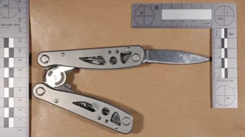 Crown Prosecution Service Image of the weapon  utilized  successful  the attack, silver, with a folding hinge