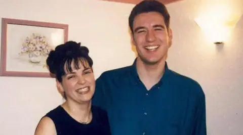 Scottish Police family photo with smiling Veronica Wilson and Alistair