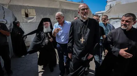 Getty Images Jerusalem Greek Orthodox Patriarch Theophilos III and Jerusalem Latin Patriarch Cardinal Pierbattista Pizzaballa visit the Holy Family Church, in Gaza City