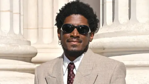 Labrinth attends the Saint Laurent Menswear Spring/Summer 2026 show as part of Paris Fashion Week on June 24, 2025 in Paris, France.