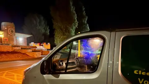 Cleethorpes Wildlife Rescue The Cleethorpes Wildife Rescue van in the foreground with zoo buildings and fire engines in the background.